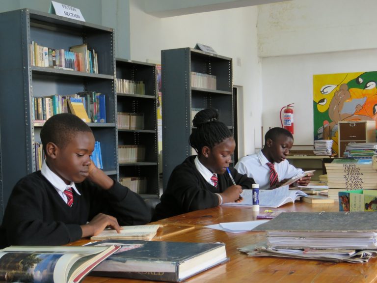 Mpelembe Secondary Schools Students in Library